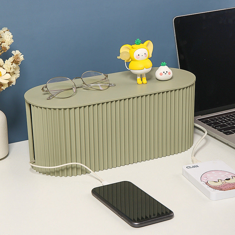 Green ribbed cable management box with oval lid