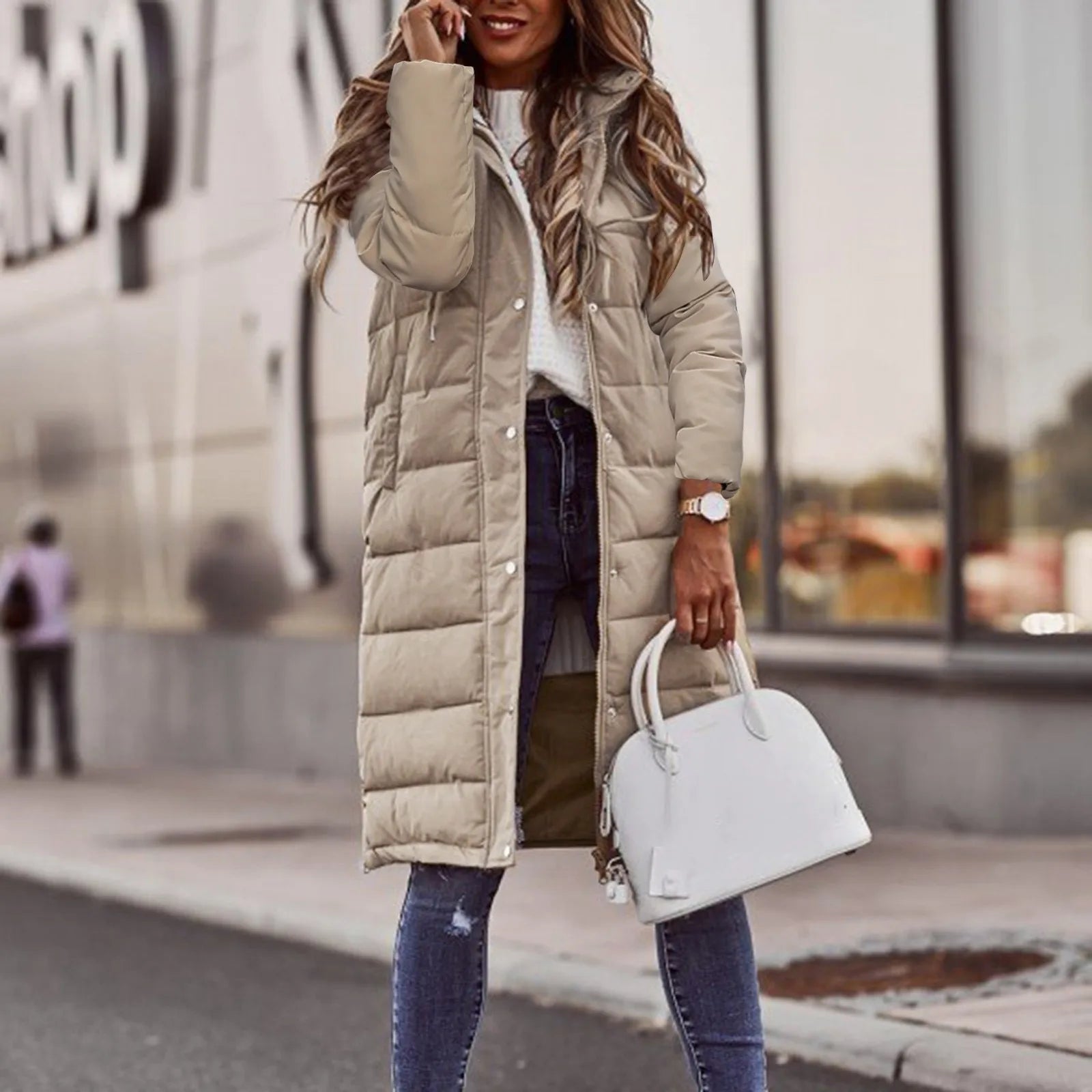 Padded long coat with quilted panels and snap button closure, regular fit, women, worn outdoors