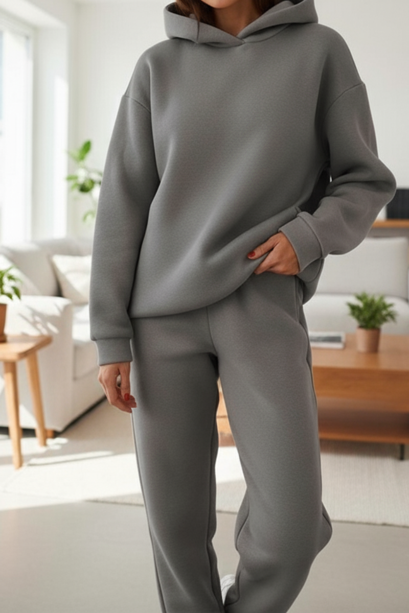 Women’s grey cotton tracksuit set with oversized hoodie and tapered sweatpants, comfortable casual fit