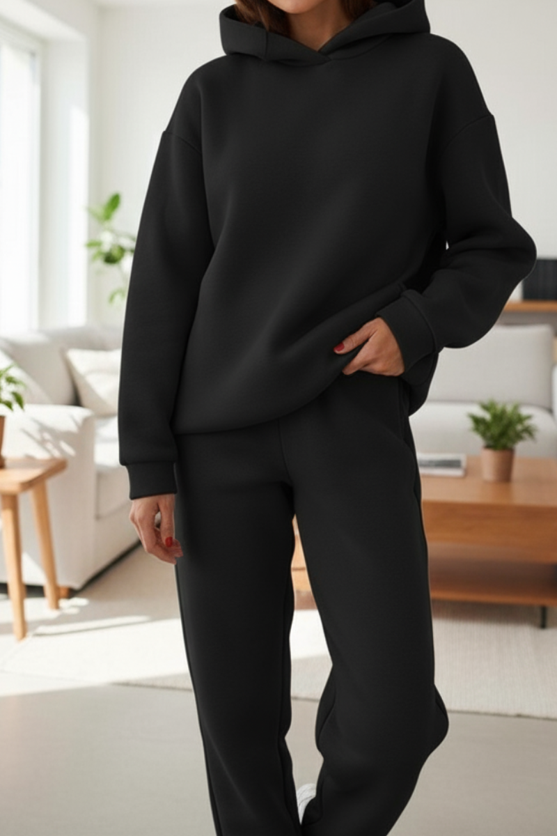 Women’s black cotton jogging set with oversized hoodie and slim leg sweatpants, casual matching outfit