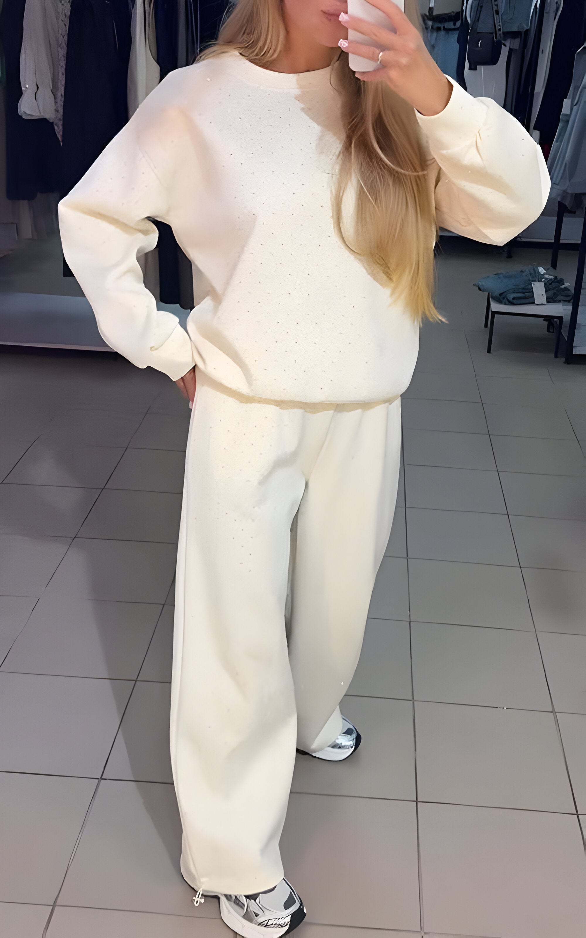 Two-piece loungewear set with loose top and straight-leg pants, relaxed fit, women, worn indoors