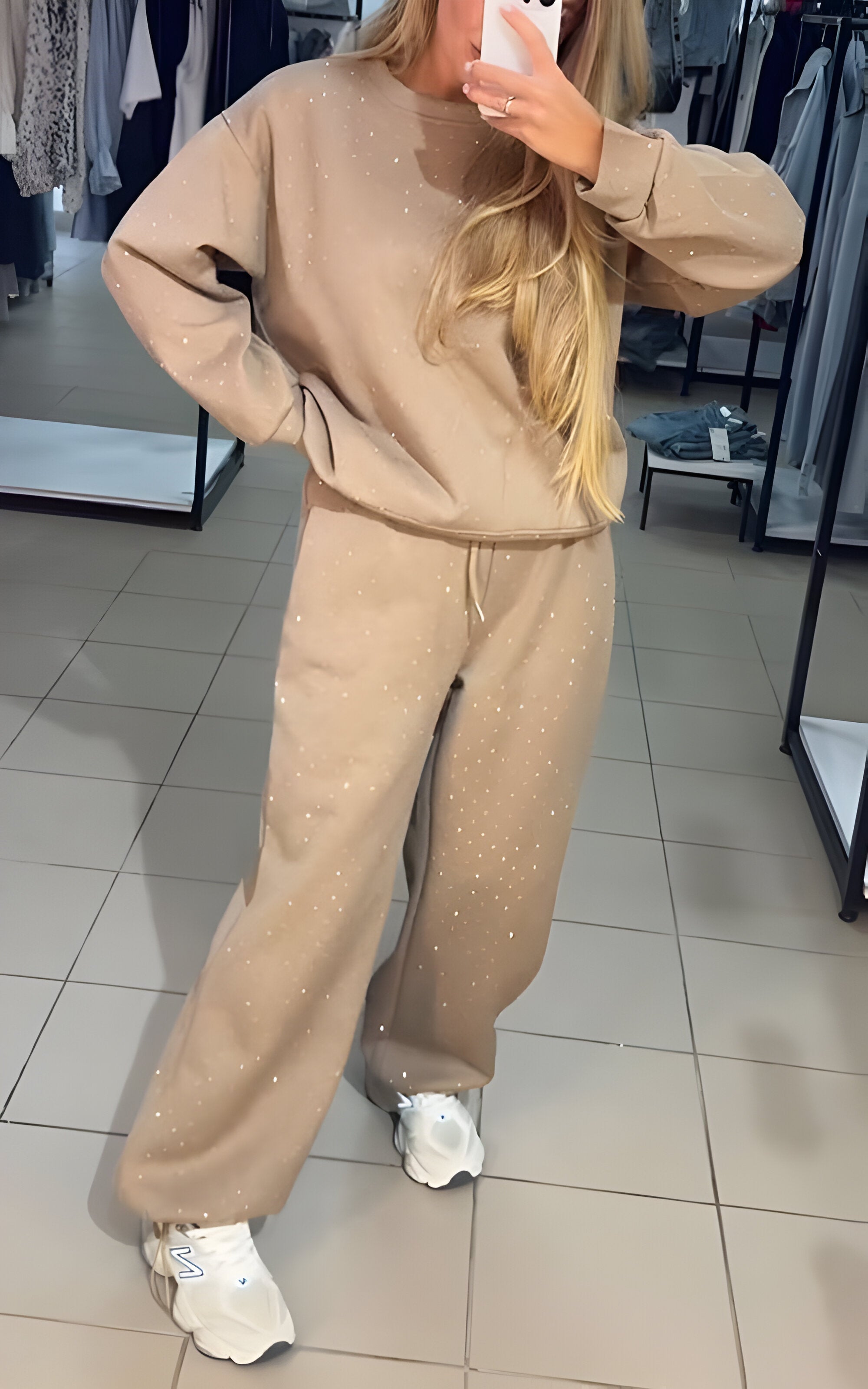 Two-piece loungewear set with round neckline top and elastic waist pants, relaxed fit, women, worn indoors