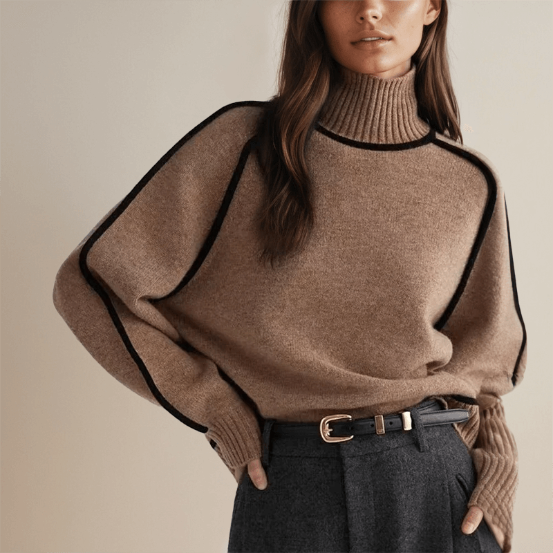 Women's knit sweater with ribbed turtleneck collar and contrast trim detail