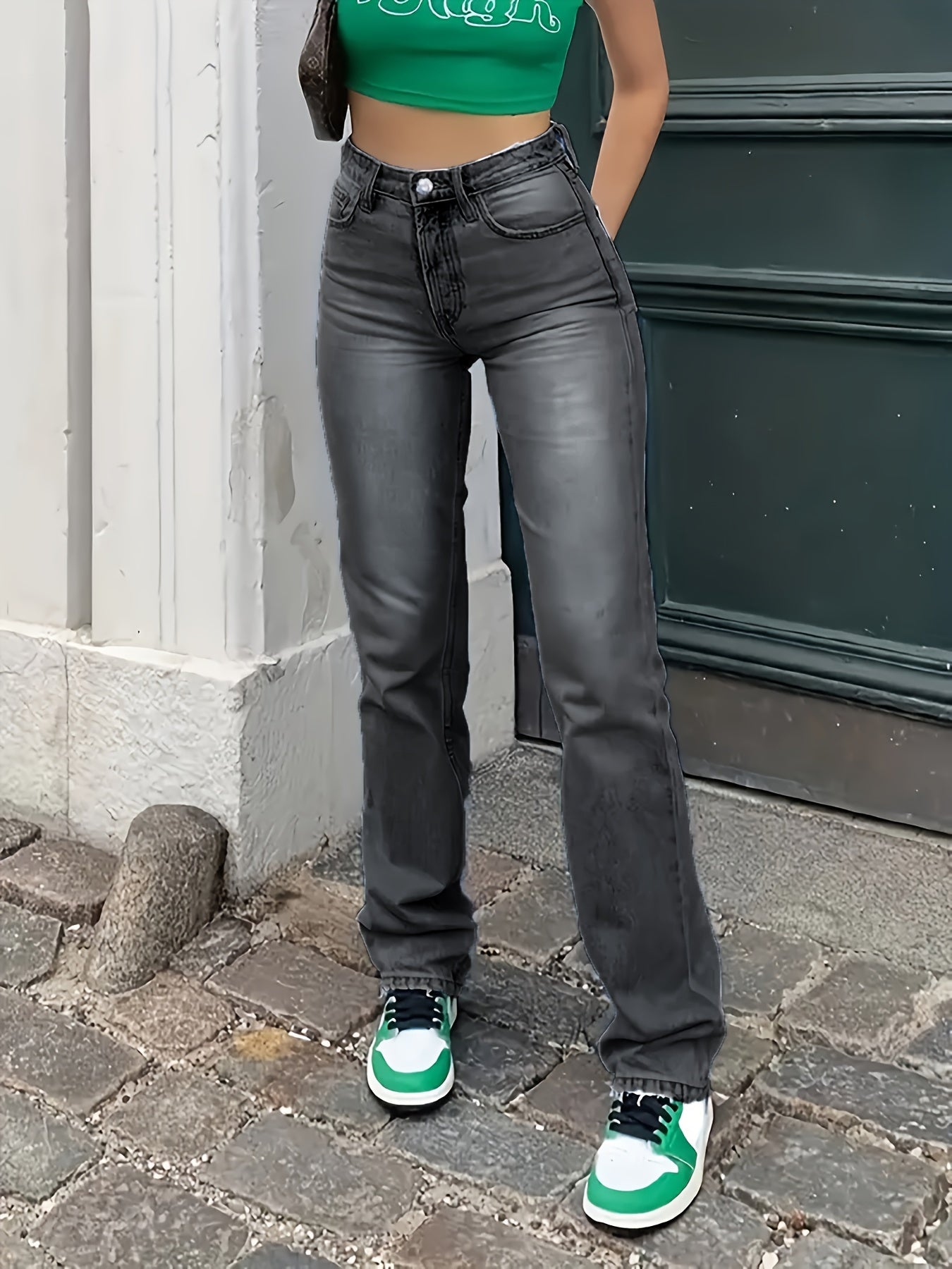 High-waist straight-leg jeans in dark grey/black wash with fitted hips and straight legs.