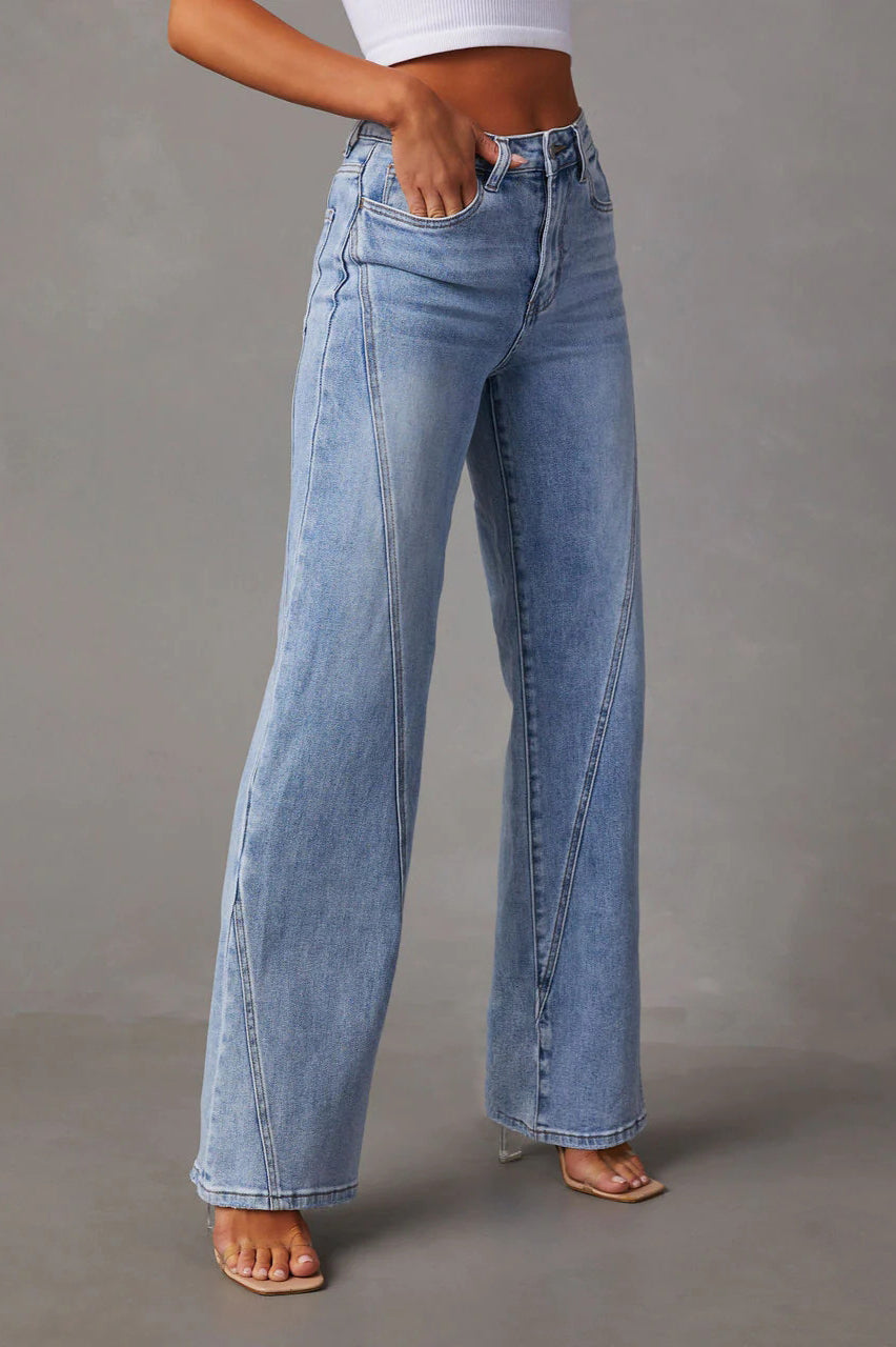 Denim wide-leg jeans with button closure and belt loops, casual fit, women, worn