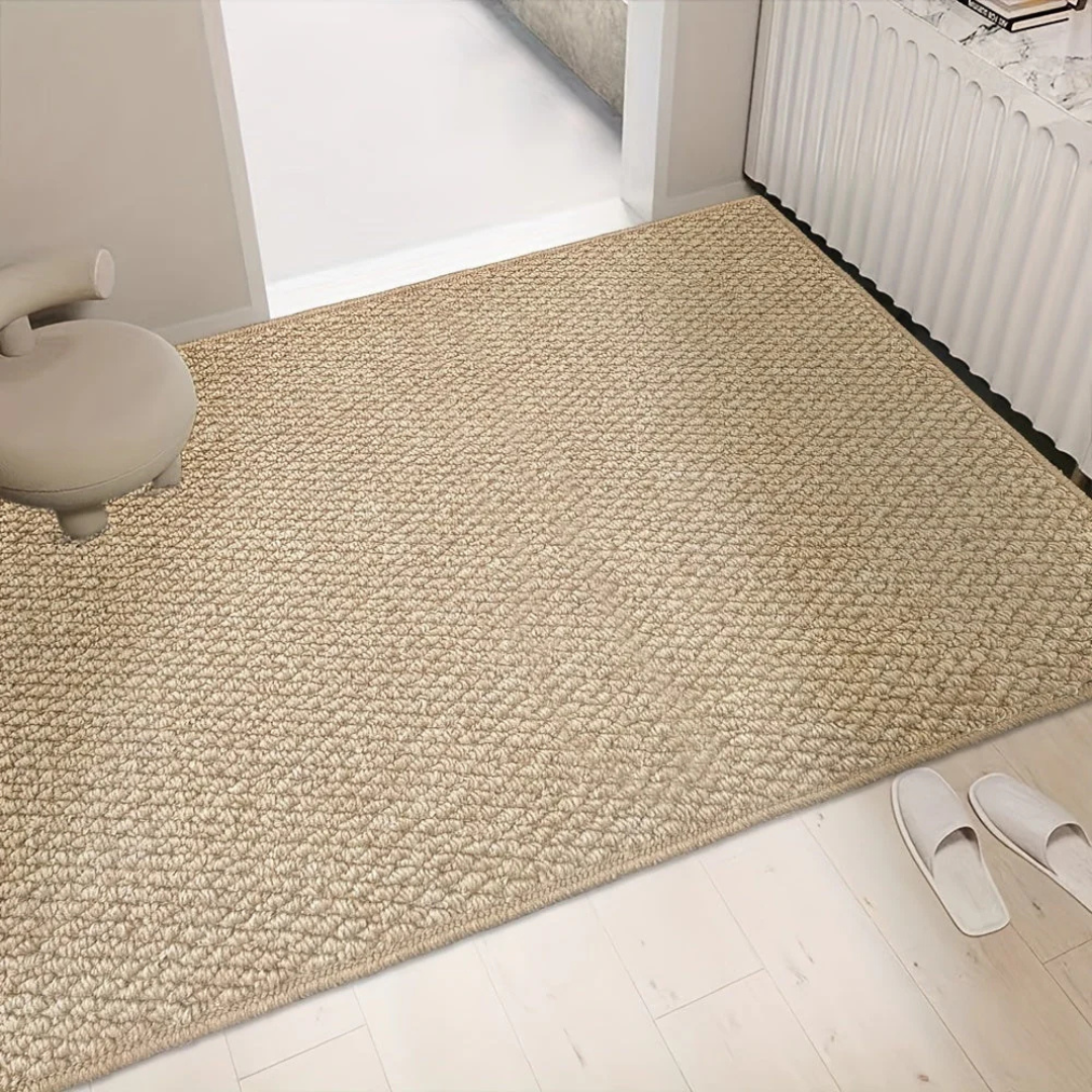 Flat woven rectangular floor mat with structured weave and reinforced edges for indoor use