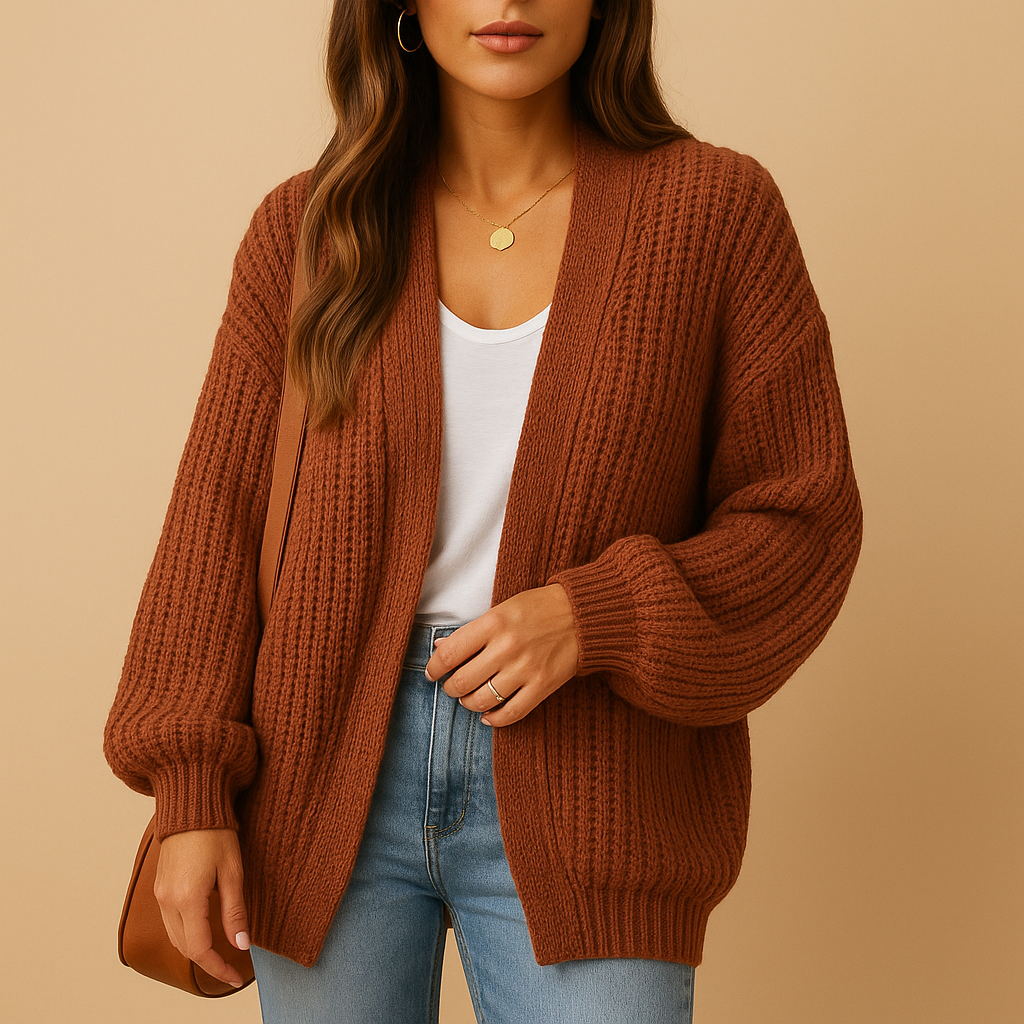 Rust brown knitted cardigan for women with open front and ribbed cuffs.