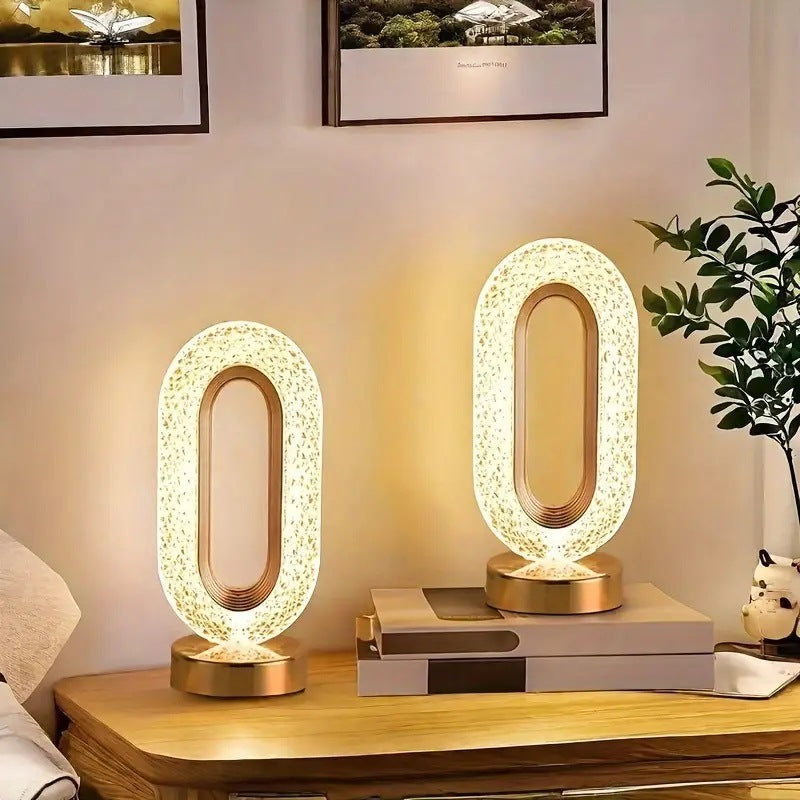 oval LED table lamps with sparkling crystal finish and gold bases