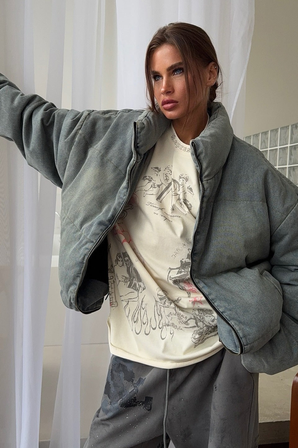 Padded jacket with raised collar and full-length zipper, oversized fit, women, worn