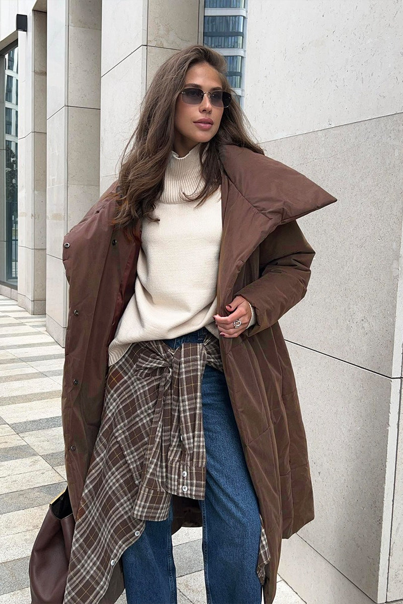 Padded long coat with oversized collar and snap front, oversized fit, women, worn outdoors