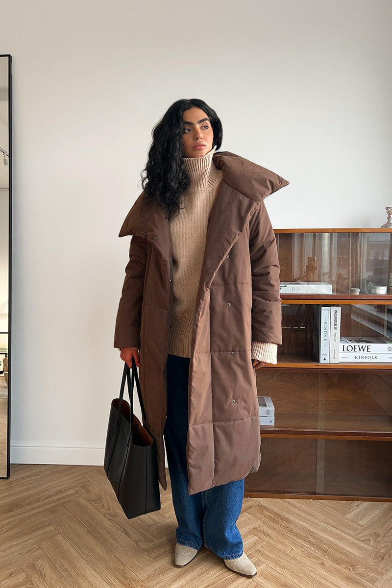Padded long coat with open front and long sleeves, oversized fit, women, worn outdoors