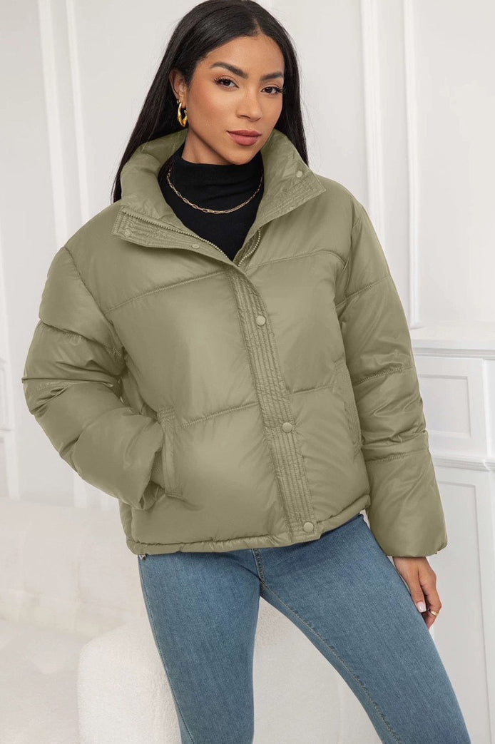 Padded puffer jacket with structured shoulders and straight hem, loose fit, women, studio view