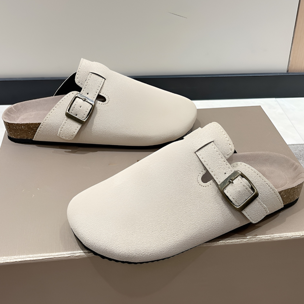 Slip-on clog with cut-out detailing and textured rubber sole for casual use