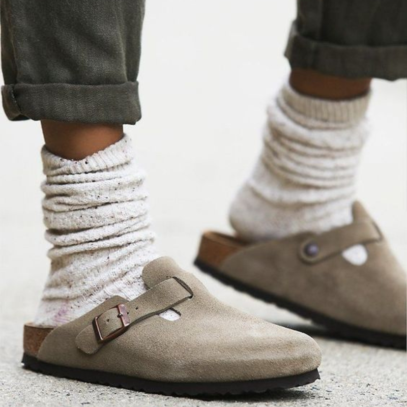 Low-profile unisex clog with adjustable upper strap and matte finish