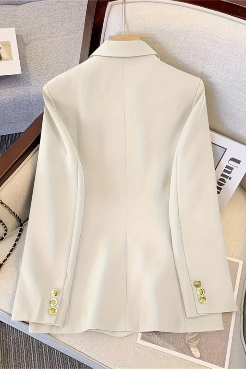 Woven blazer back view with structured panel construction and long sleeves tailored for women