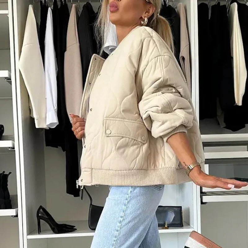 Cropped quilted jacket with ribbed hem and snap-button front for women