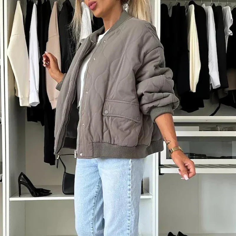 Women's padded bomber jacket with snap-button fastening and ribbed collar