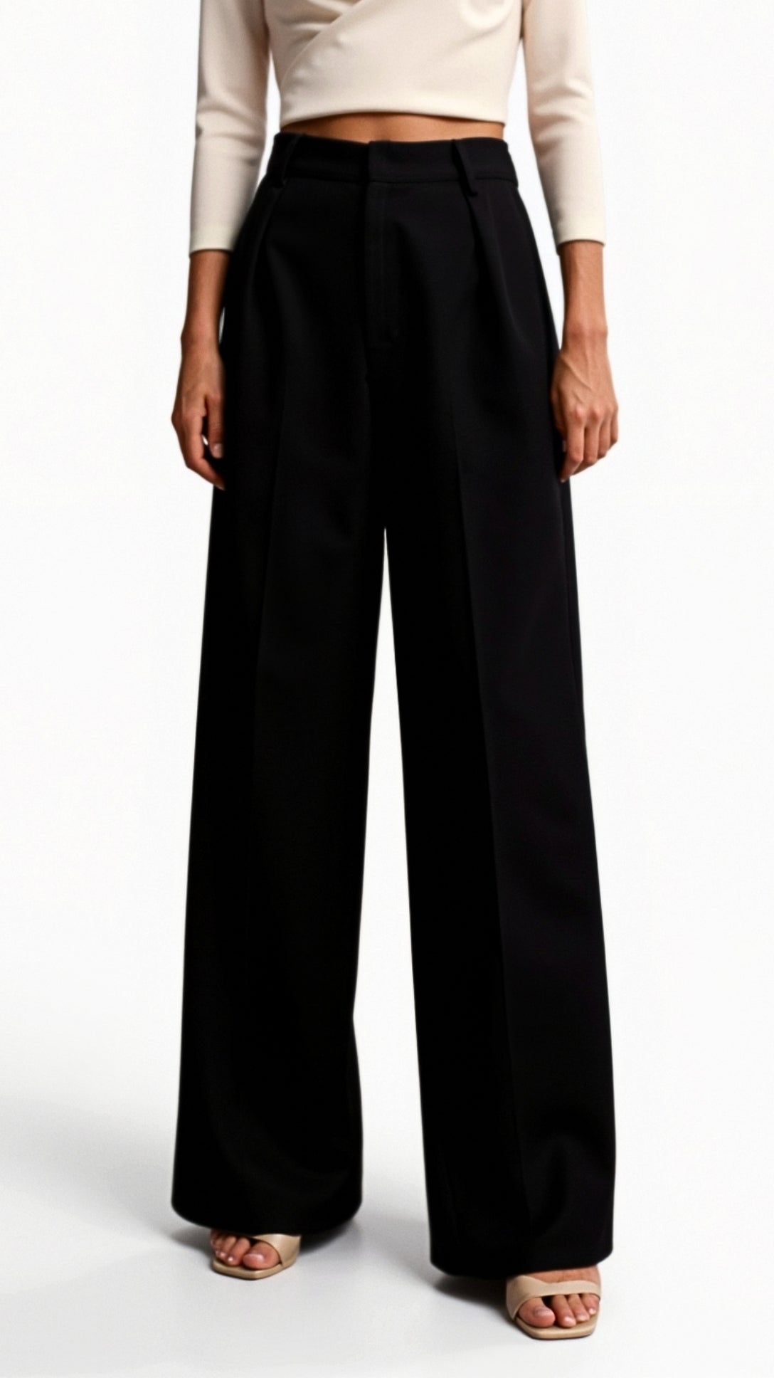 High-waisted pleated trousers in a full-length wide-leg silhouette for women