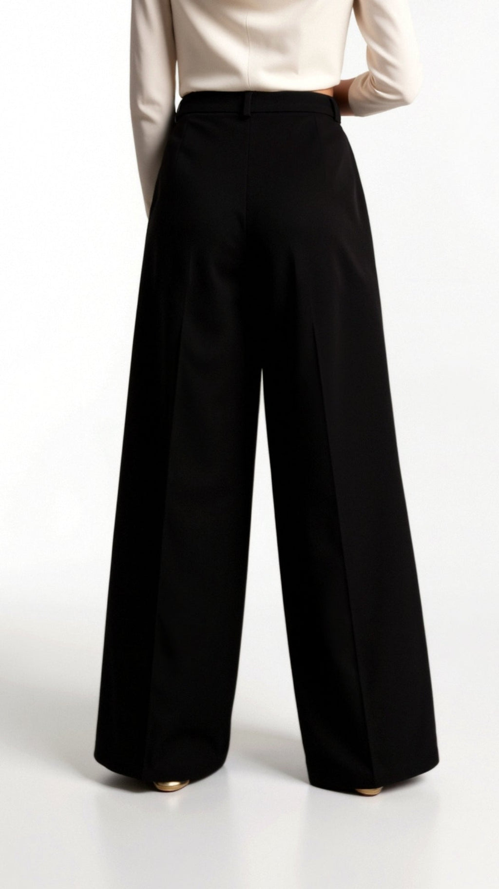 Women's woven trousers featuring a high-rise waistband and wide leg cut