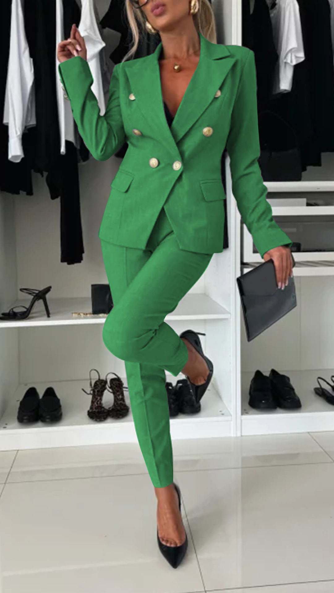 Women’s green tailored blazer and slim-fit trousers suit