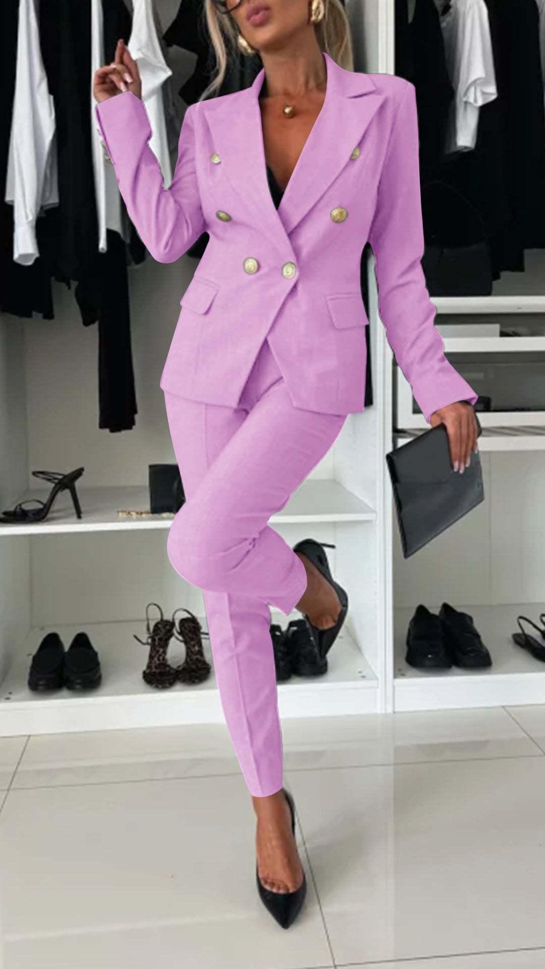 Women’s pastel pink double-breasted blazer and slim-fit pants suit