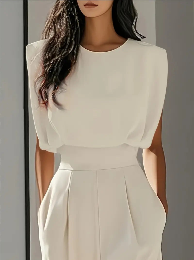 Woven wide leg jumpsuit with front pleats sleeveless bodice and full length silhouette for women